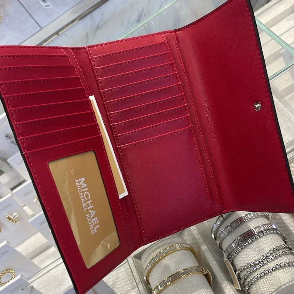 MICHAEL KORS Jet Set Travel Signature Logo Tri-Fold Wallet
DARK RASPBERRY MULTI - Picture 13 of 16